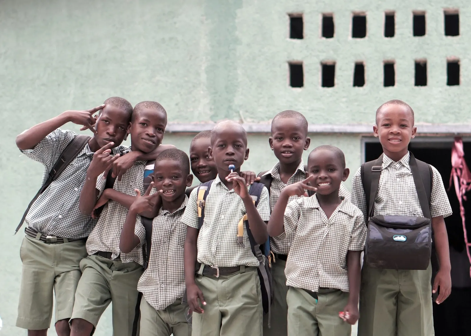 Group of smiling schoolboys outdoors