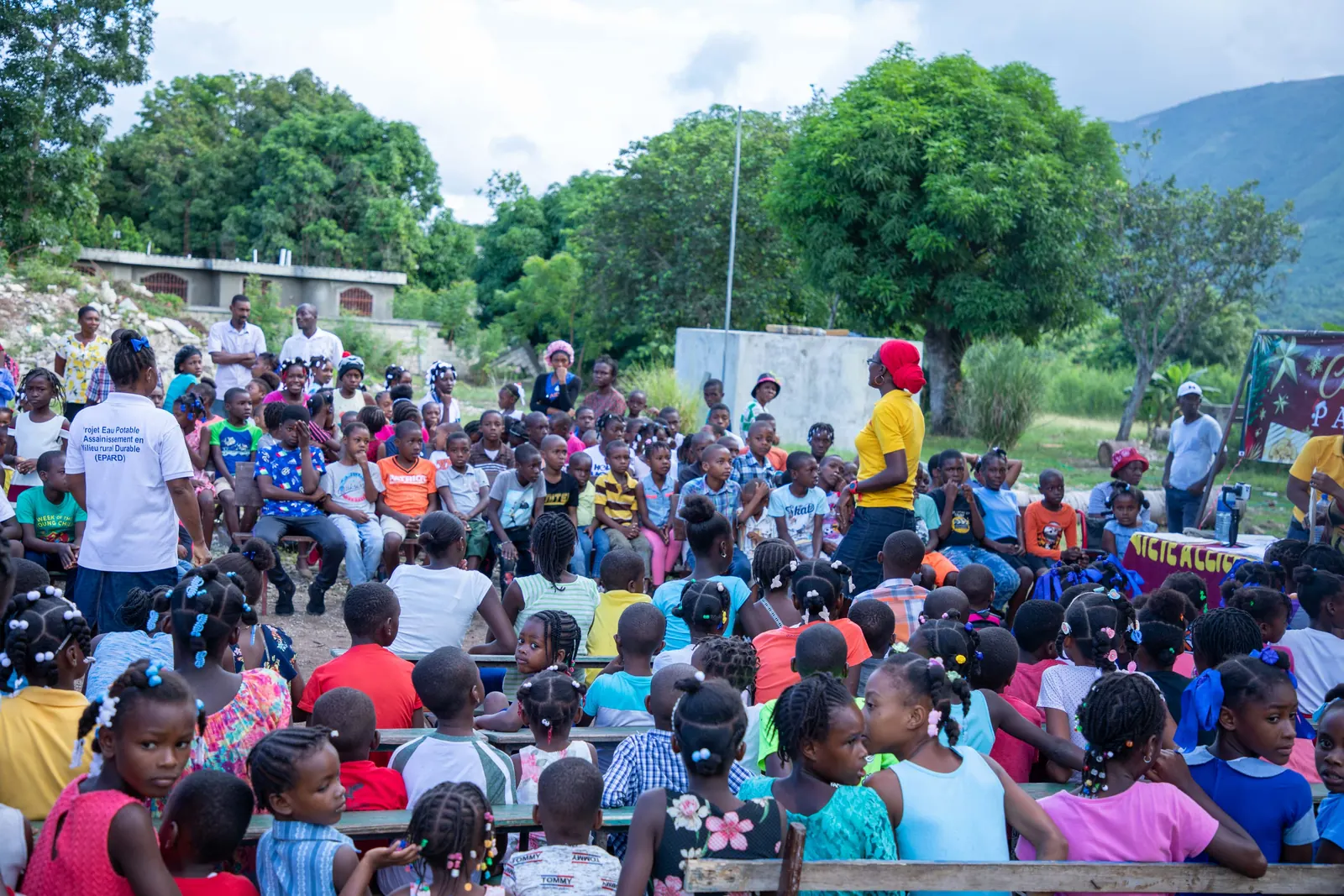 Large outdoor gathering of children for a club